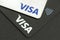 Black and white credit cards Visa close up. Visa contactless payment cards closeup. Top view. Selective focus