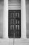 Black and white door frame with columns