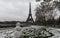The black and white Eiffel tower with snowman in the foreground, Paris, France