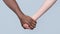 Black and white hand Love Partnership. Black, White Woman and man Holding Hands Together