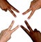 Black and white hands making peace sign