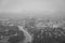 Black & white hazy cityscape view from the Hollywood Bowl Overlook on Mulholland Drive, in Los Angeles, California