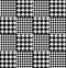 Black and white houndstooth pattern patchwork fabric swatch