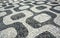 Black and white iconic mosaic, Portuguese pavement by old design pattern at Ipanema beach, Rio de Janeiro