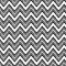 Black and white ikat ornament geometric chevron fabric seamless pattern, vector