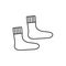 Black & white illustration of knitted warm socks. Vector line icon of winter handmade clothes. Isolated object