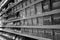 Black and White Image of Different types of cheese on shelves in a grocery store. Shelf of packaged products, butter and cheese at