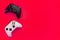 Black and white joystick on red background