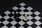 Black and white king on chessboard. Victorious and defeated king figure. Chess figurine order.Game banner template