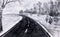 Black white landscape. Asphalt road leading to the church. Ink drawing