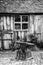 Black and white landscape of old blacksmiths workshop in Victorian times