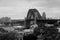 Black and white landscape view of Sydney Harbour Bridge