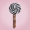 Black and white lollipop with a knife handle on a pink background