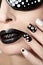 Black and white makeup and manicure.