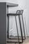 Black and white metal stools. Modern minimal Scandinavian furniture design concept.