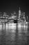 Black and white night view of Manhattan waterfront, New York, USA