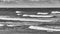 Black and white panoramic seascape on a stormy day