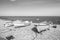 Black and white photo of boats on the shore in Selsey in England