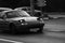Black and white photo, classic, vintage car. Classic car with hidden headlight on the roads of Bucharest, Romania, 2020