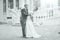 Black and white photo dancing bride and groom