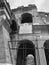 Black and white photo low-angle close up view of west outer wall exterior section of the Colosseum