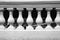 black - white photo of a plaster balustrade with balusters