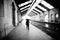 black and white photograph of a deactivated train station in the city of Barreiro on a rainy day.