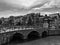 Black and White Photography of View of Amsterdam canals with bridge and typical dutch houses. Holland