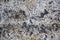 Black and white porous granular stone. rough surface texture