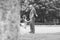 Black and white portrait of Happy grandfather and granddaughter playing outdoors