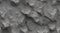 Black white rock texture. Dark gray stone granite background for design. Rough cracked mountain surface. Close-up. Crumbled.