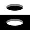 Black and white round holes on a surface 3D perspective view.