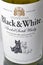 Black and White Scotch Whisky bottle closeup