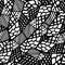 Black and white seamless texture with a graphic pattern of triangles.