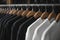 Black and White Shirts on Rack extreme closeup. Generative AI