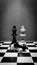 Black and white shot of chess pieces of white and black kings with white and black pawns lying in front of them on a chessboard