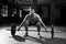 Black And White Shot Of Man Preparing To Lift Weights