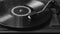 Black and white shot of a record player playing vinyl. Retro Vinyl Turntable Stylus