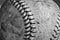 Black and white shot of a softball that has been chewed