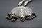 Black and white Silver artifact decoration  traditional necklace jewellery on shadow  black background
