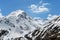 Black-and-white slope of mountains in the spring Alps