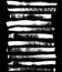 Black and white sponge print striped grunge brushes. Vector illustration