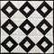 Black And White Square Quilt With Diamond Blocks