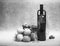 Black and white still-life with wine and fruit