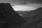 Black and white Stunning colorful landscape image of view down Honister Pass to Buttermere from Dale Head in Lake District during