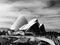 Black and white Sydney Opera House rear view from city