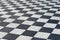 Black and white tiles. Chess floor.