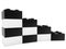 Black and white toy bricks stacked in the form of steps on white