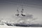 Black and white view on chair-lift and mountains