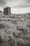 Black and white view of an old outhouse in South Pass City Ghost Town